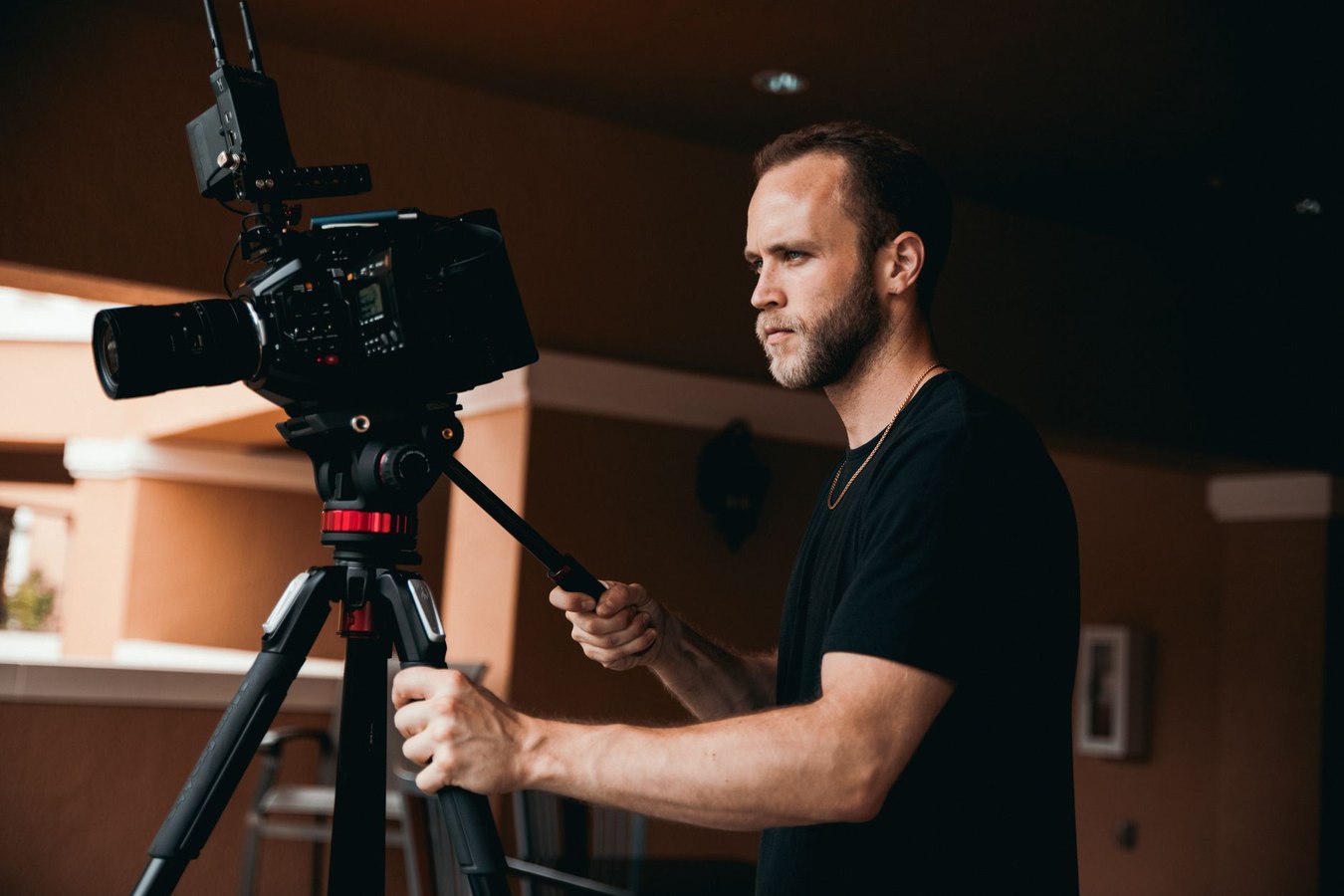 Student cinematography setup demonstrating proper tripod and lighting configuration
